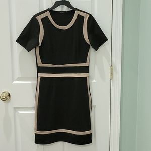 Musol Business style dress. Black with tan piping.